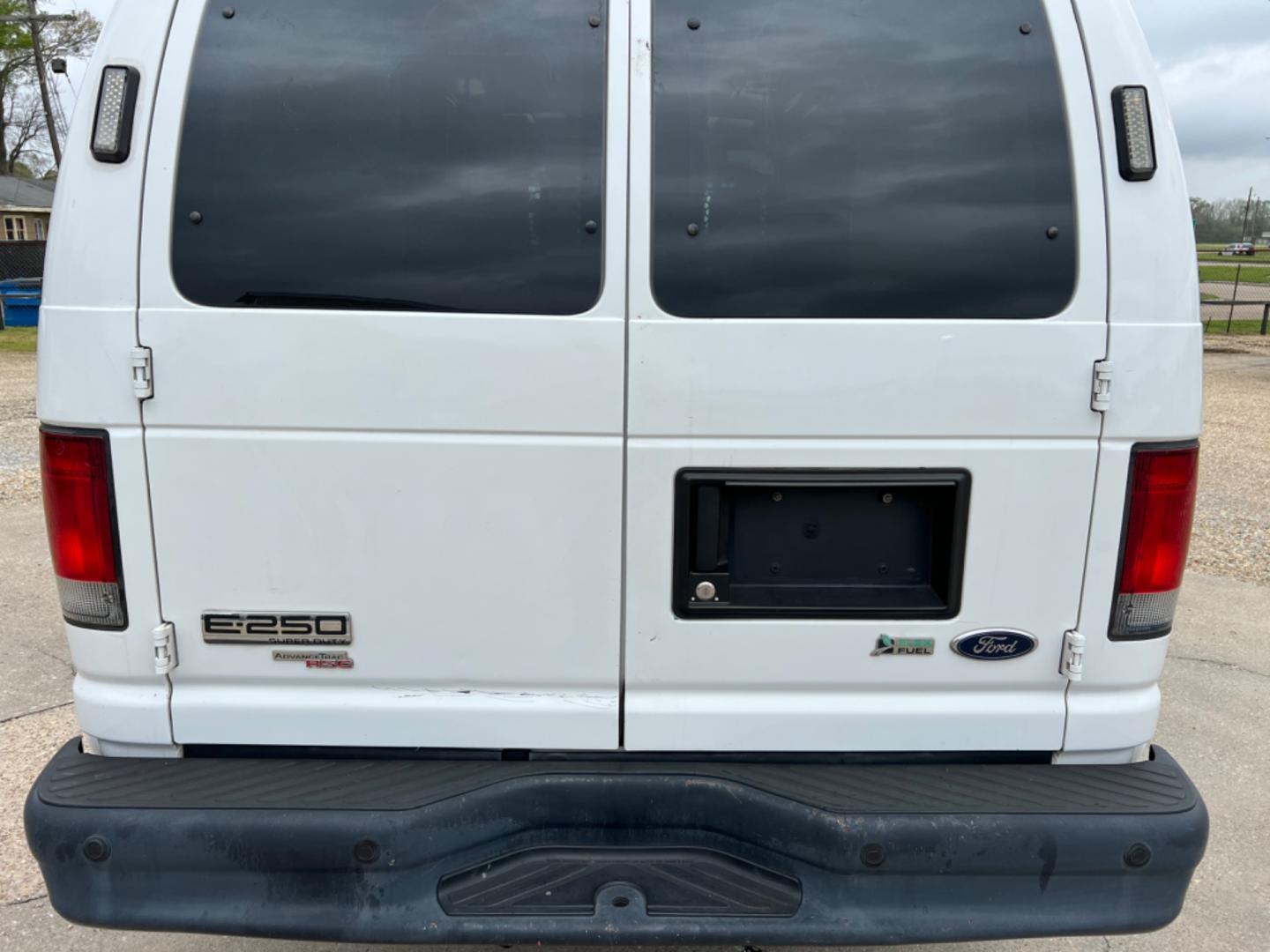 2012 White /Gray Ford E-Series Van (1FTNE2EL7CD) with an 5.4 V8 engine, Automatic transmission, located at 4520 Airline Hwy, Baton Rouge, LA, 70805, (225) 357-1497, 30.509325, -91.145432 - 2012 Ford E-250 Cargo Van 5.4 V8 Gas, 156K Miles, Power Windows & Locks, Shelves For Tools Or Parts. NO IN HOUSE FINANCING. FOR INFO PLEASE CONTACT JEFF AT 225 357-1497 CHECK OUT OUR A+ RATING WITH THE BETTER BUSINESS BUREAU WE HAVE BEEN A FAMILY OWNED AND OPERATED BUSINESS AT THE SAME LOCATION FOR - Photo#6